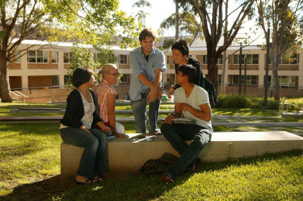 Group of people talking. While digital technologies enable people to connect across distances, without physical co-presence connections may remain relatively shallow.  Credits CC BY 2.0