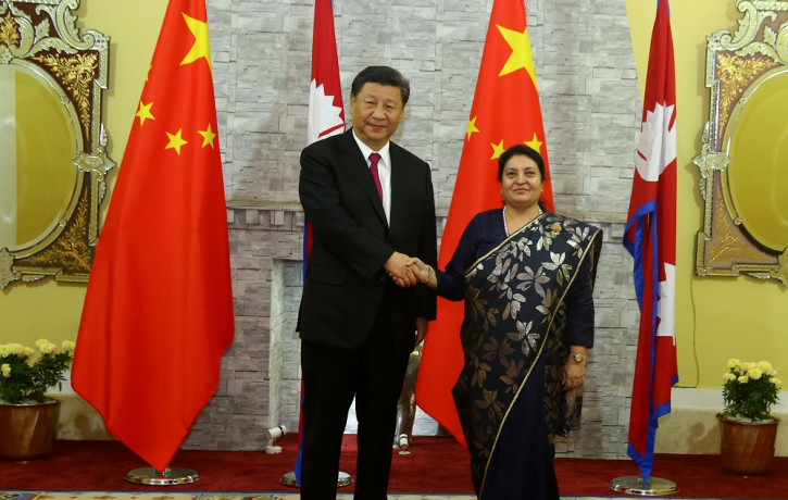 President Bidya Devi Bhandari welcomes her Chinese counterpart Xi Jinping at the former's office in Shhetal Niwas Saturday evening.