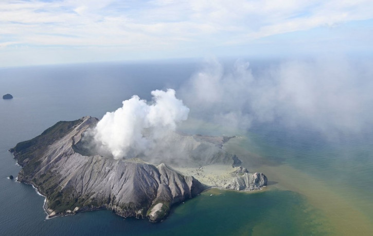 This aerial photo shows White Island after its volcanic eruption in New Zealand Monday, Dec. 9, 2019. The volcano on a small New Zealand island frequented by tourists erupted Monday, and a nu