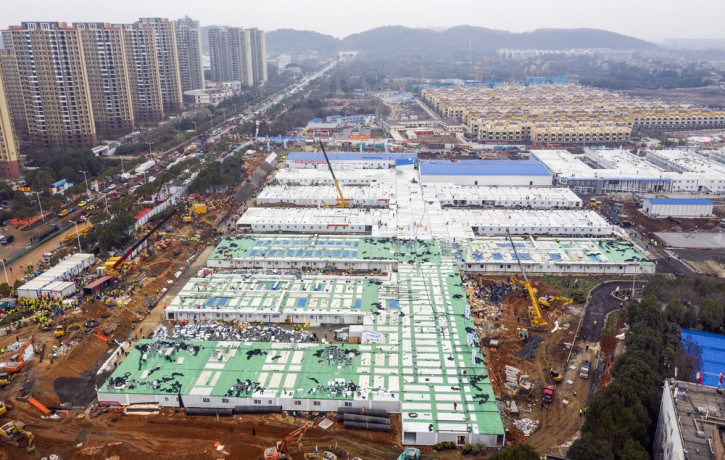 The Huoshenshan temporary field hospital under construction is seen as it nears completion in Wuhan in central China's Hubei Province, Sunday, Feb. 2, 2020.