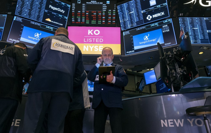 Traders work on the floor of the New York Stock Exchange Thursday, Feb. 27, 2020.