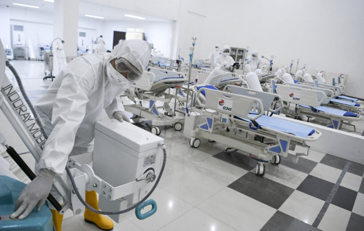 Staff inspect medical equipments at an emergency hospital set up amid the new coronavirus outbreak in Jakarta, Indonesia, Monday, March 23, 2020.