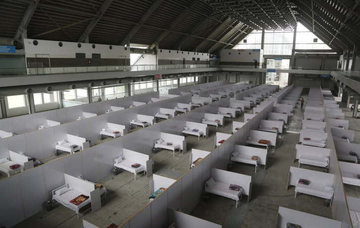 An emergency hospital is set up with nine hundreds beds for coronavirus infected patients, in the Expo Center, Lahore, Pakistan, Thursday, March 26, 2020.
