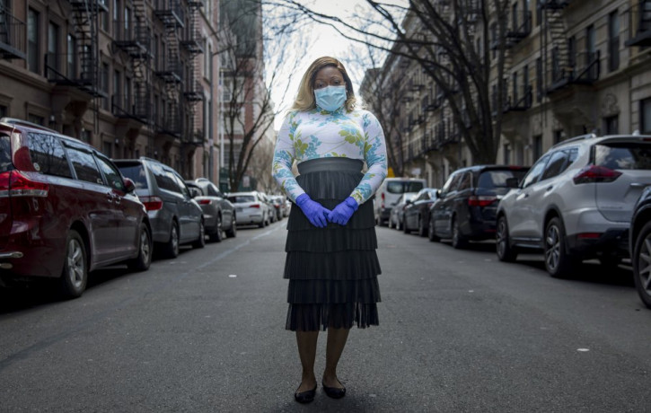 Tiffany Pinckney poses for a portrait in the Harlem neighborhood of New York on April 1, 2020. After a period of quarantine at home separated from her children, she has recovered from COVID-1
