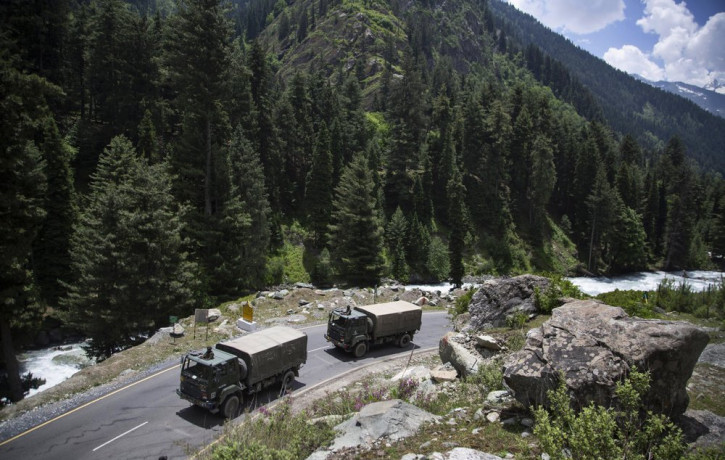 An Indian army convoy moves on the Srinagar- Ladakh highway at Gagangeer, north-east of Srinagar, India, Wednesday, June 17, 2020.