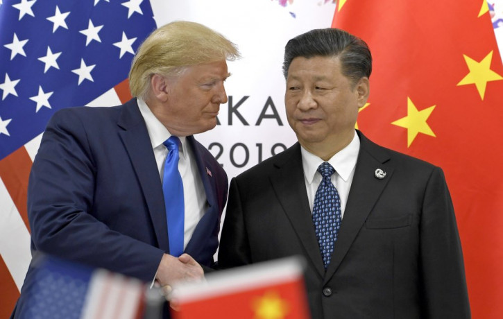 - In this June 29, 2019, file photo, U.S. President Donald Trump, left, shakes hands with Chinese President Xi Jinping during a meeting on the sidelines of the G-20 summit in Osaka, western J