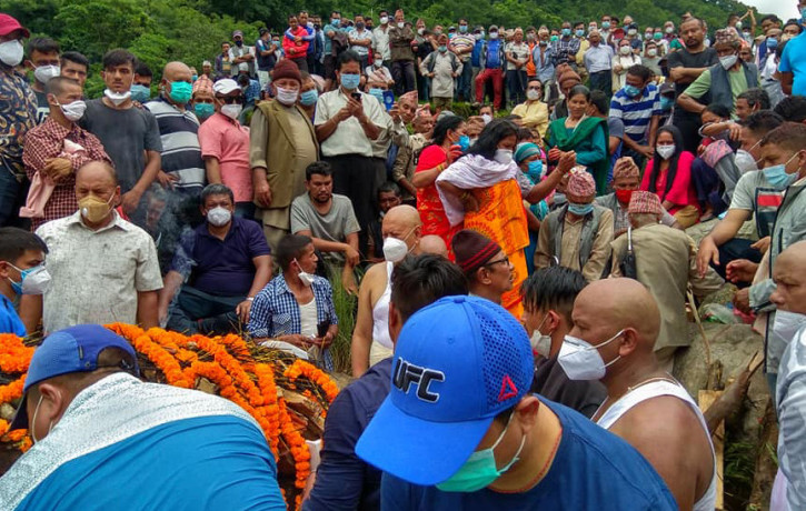 Families and locals attending cremation of Basnet. Photo Courtesy: Dipak Dulal
