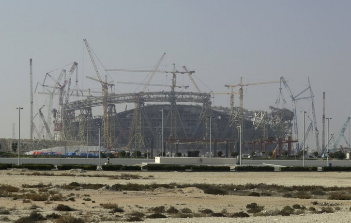 In this Dec. 20, 2019 file photo, construction is underway at the Lusail Stadium, one of the 2022 World Cup stadiums, in Lusail, Qatar.