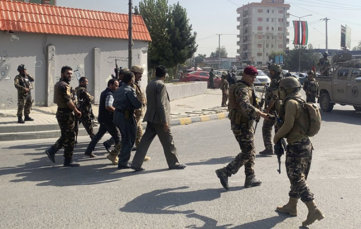 Afghan security personnel arrive at the site of an explosion in Kabul, Afghanistan, Wednesday, Sept. 9, 2020.