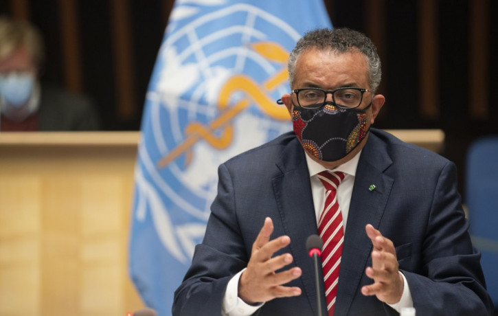 In this photo released by WHO on Monday, Oct. 5, 2020, WHO Director-General, Dr Tedros Adhanom Ghebreyesus, wearing a mask to protect against coronavirus, gestures during a special session on