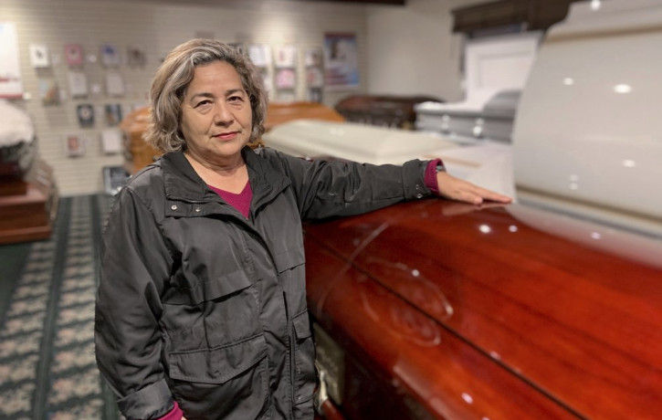 Magda Maldonado, owner of Continental Funeral Home in Los Angeles, poses in her mortuary on Dec. 30, 2020.