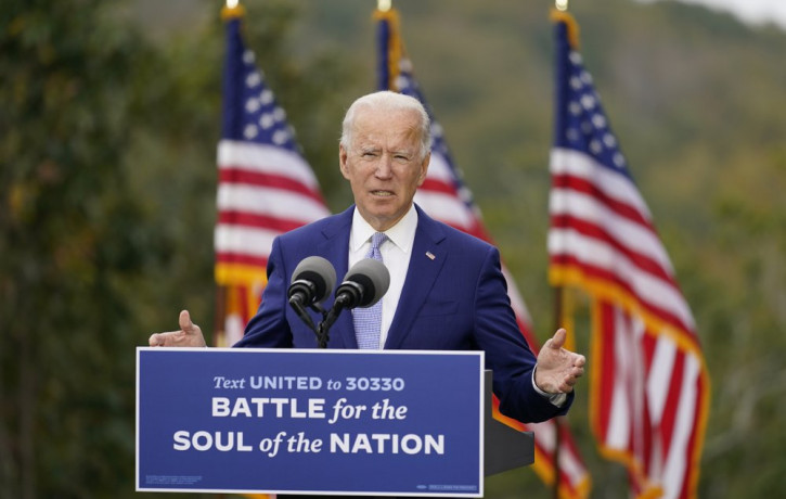 In this Oct. 27, 2020, file photo, then-Democratic presidential candidate former Vice President Joe Biden speaks at Mountain Top Inn & Resort in Warm Springs, Georgia.