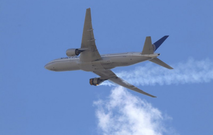This Saturday, Feb. 20, 2021 photo provided by Hayden Smith shows United Airlines Flight 328 approaching Denver International Airport, after experiencing "a right-engine failure" shortly afte