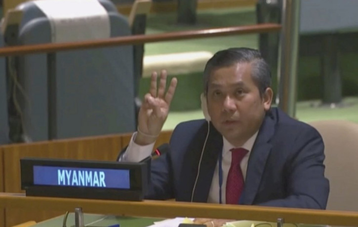 Myanmar Ambassador to the United Nations Kyaw Moe Tun flashes the three-fingered salute, a gesture of defiance done by anti-coup protesters in Myanmar, at the end of his speech before the U.N