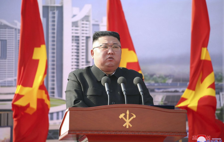 In this photo provided by the North Korean government, North Korean leader Kim Jong Un speaks during a ceremony to break ground for building 10,000 homes, in Pyongyang, North Korea, Tuesday, 