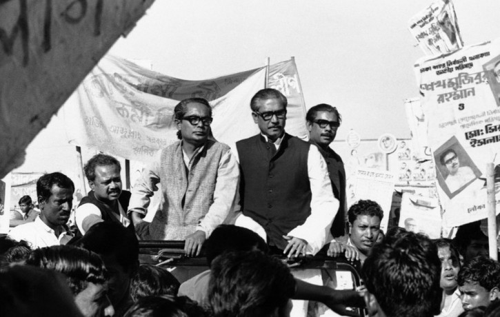 In this Dec. 7, 1970, file photo, Sheikh Mujibur Rahman, center on Rostrum, leader of East Pakistan's powerful Awami League, addresses an election rally in Dacca, East Pakistan.