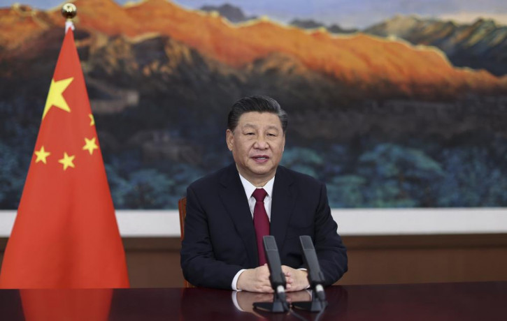 In this April 20, 2021 file photo released by Xinhua News Agency, Chinese President Xi Jinping delivers a keynote speech via video for the opening ceremony of the Boao Forum for Asia (BFA) An
