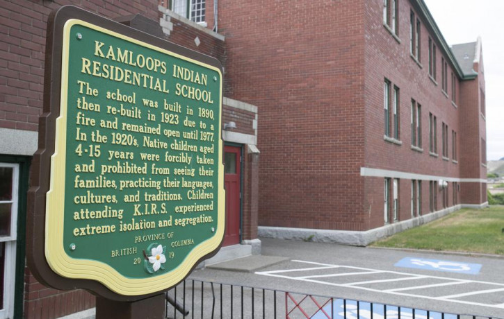 A plaque is seen outside of the former Kamloops Indian Residential School on Tk'emlups te Secwépemc First Nation in Kamloops, British Columbia, Canada on Thursday, May 27, 2021.