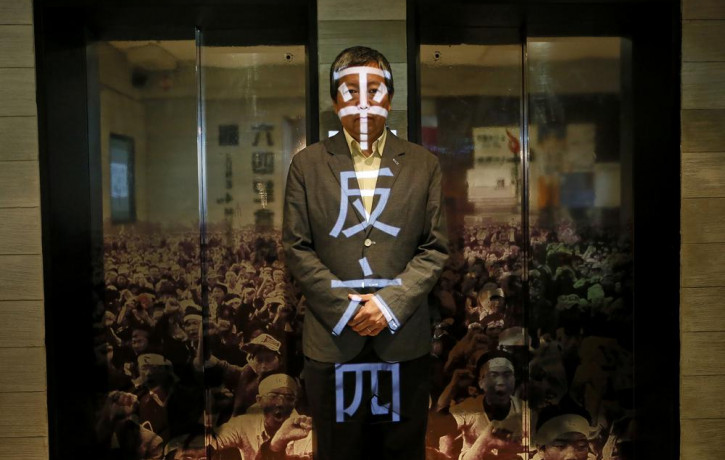 In this May 28, 2014, file photo, Lee Cheuk Yan poses at the June 4 Museum his pro-democracy group operates in Hong Kong.