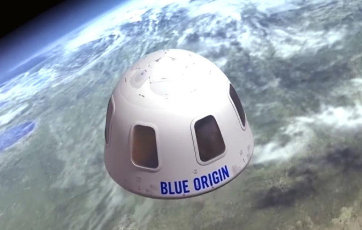 This undated file illustration provided by Blue Origin shows the capsule that the company aims to take tourists into space. The price to rocket into space next month with Jeff Bezos and his b