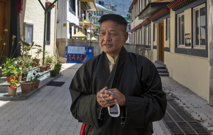 In this May 27, 2021, file photo, Penpa Tsering, the newly elected President of the Central Tibetan Administration, poses for a photograph after taking oath of office in Dharmsala, India.