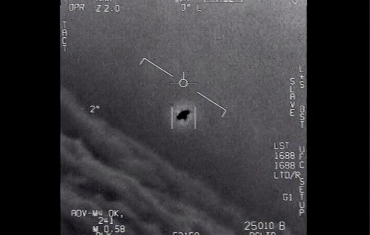 The image from video provided by the Department of Defense labelled Gimbal, from 2015, an unexplained object is seen at center as it is tracked as it soars high along the clouds, traveling ag