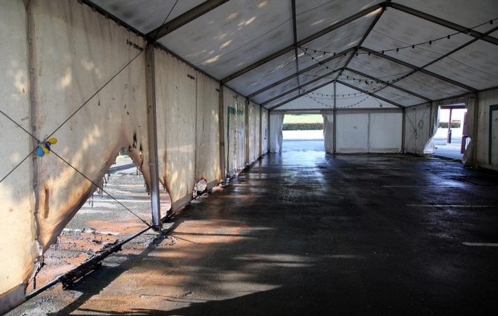 A view of the empty tent of a vaccination center after an arson attack on Saturday evening in Urrugne, southwestern France, Monday, July 19, 2021.