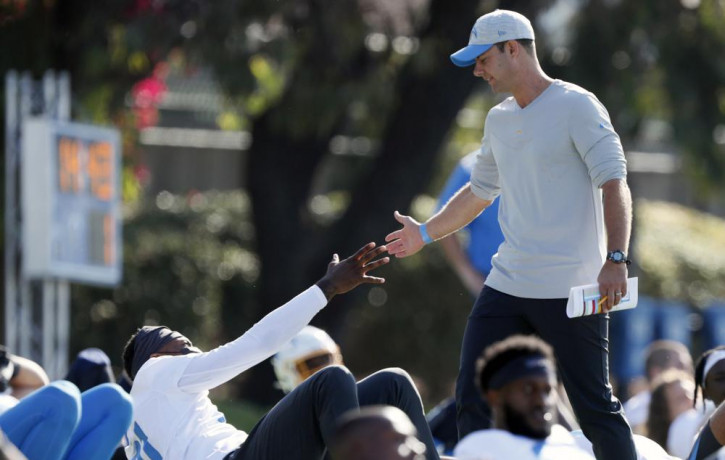 In this July 28, 2021 photo, Los Angeles Chargers head coach Brandon Staley greets wide receiver Mike Williams during practice at the NFL football team's training camp in Costa Mesa, Californ