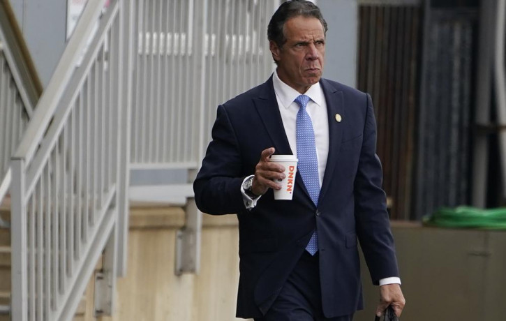 New York Gov. Andrew Cuomo prepares to board a helicopter after announcing his resignation, Tuesday, Aug. 10, 2021, in New York.