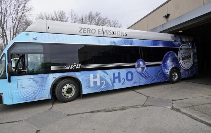 Kevin Baker, a maintenance technician, drives a hydrogen fuel cell bus out of the terminal, Tuesday, March 16, 2021, in Canton, Ohio.