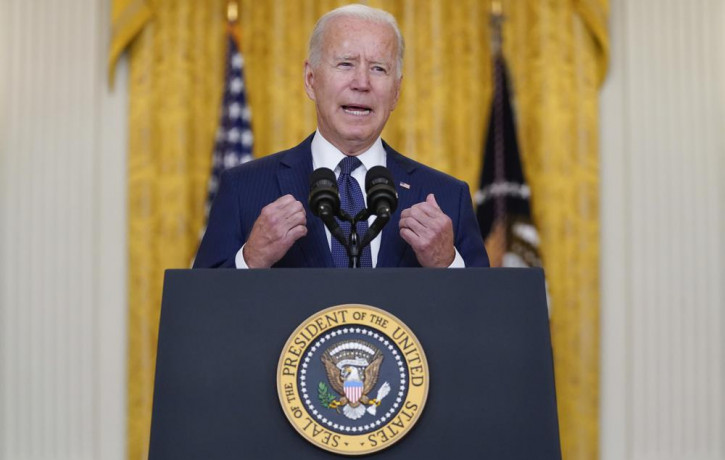 US President Joe Biden speaks about the bombings at the Kabul airport that killed at least 12 U.S. service members, from the East Room of the White House, Thursday, Aug. 26, 2021, in Washingt