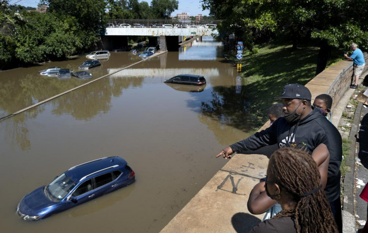 Cars and trucks are stranded by high water Thursday, Sept 2, 2021, on the Major Deegan Expressway in Bronx borough of New York as high water left behind by Hurricane Ida still stands on the h