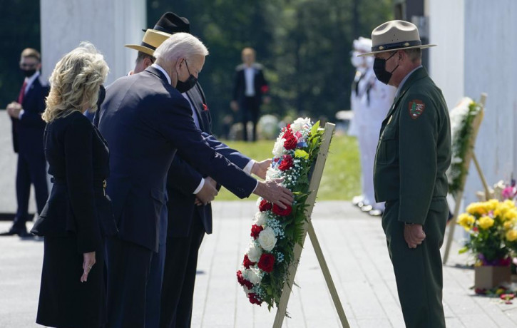 US President Joe Biden and first lady Jill Biden lay a wreath at the Wall of Names during a visit to the Flight 93 National Memorial in Shanksville, Pa., Saturday, Sept. 11, 2021.