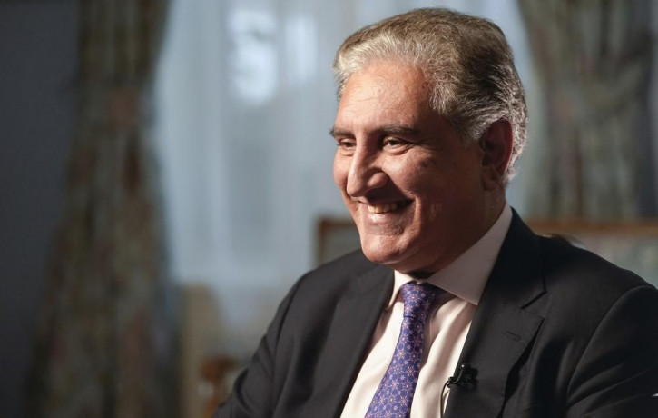 Pakistan's Foreign Minister Shah Mehmood Qureshi smiles during an interview with The Associated Press, Wednesday, Sept. 22, 2021, in New York.