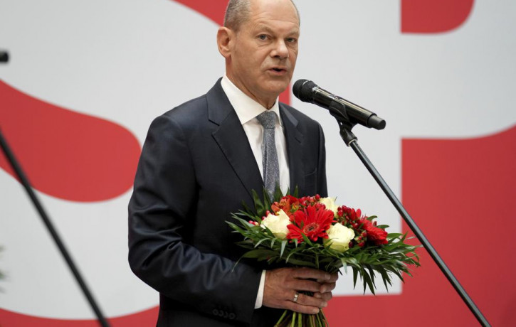 Olaf Scholz, top candidate for chancellor of the Social Democratic Party (SPD), attends a press statement at the party's headquarter in Berlin, Germany, Monday, Sept. 27, 2021.