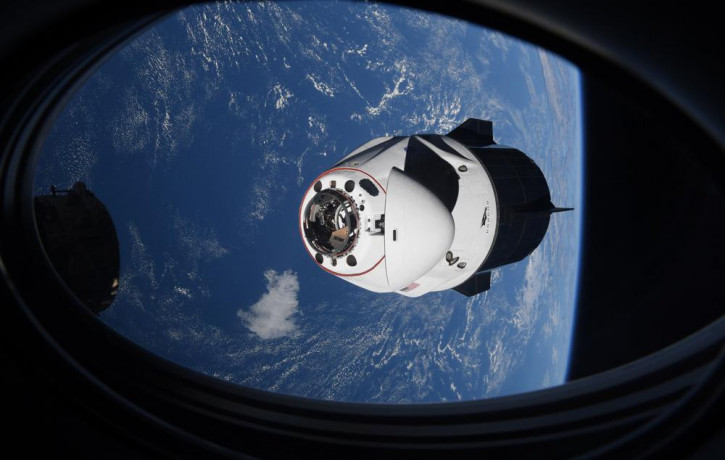 In this April 24, 2021 file photo made available by NASA, the SpaceX Crew Dragon capsule approaches the International Space Station for docking.