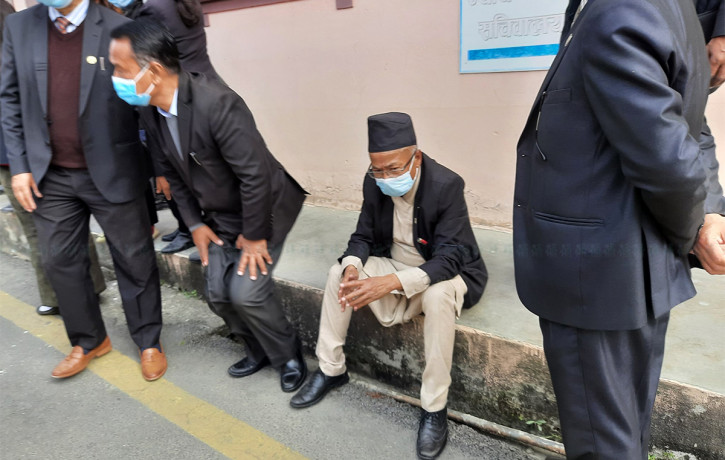 NBA Chairman Shrestha rests after falling during the clash with police on Thursday.