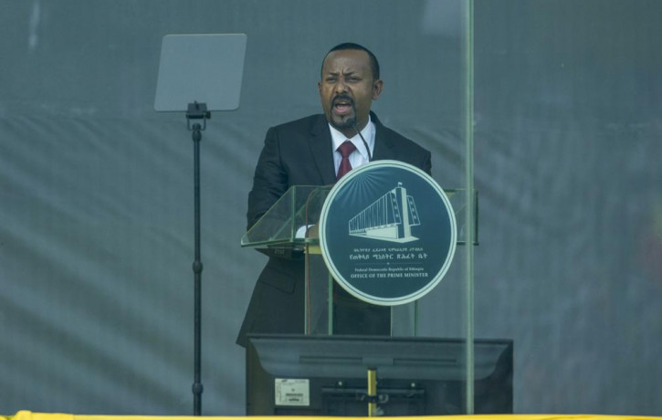 Ethiopia's Prime Minister Abiy Ahmed speaks behind bulletproof glass at his inauguration ceremony, after he was sworn in for a second five-year term, in the capital Addis Ababa, Ethiopia Mond