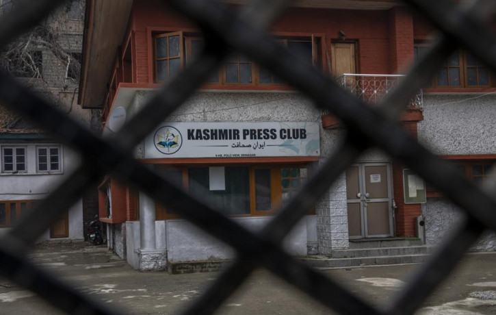 Kashmir Press Club building is pictured through a closed gate after it was sealed by authorities in Srinagar, Indian controlled Kashmir, Tuesday, Jan. 18, 2022.