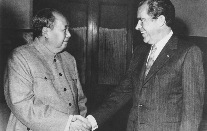 File Photo: Then Chinese communist party leader Mao Zedong, left, and then U.S. President Richard Nixon shake hands as they meet in Beijing on Feb. 21, 1972.