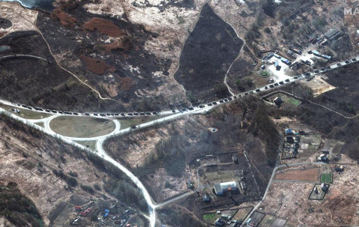 This satellite image provided by Maxar Technologies shows a military convoy near Invankiv, Ukraine Monday, Feb. 28, 2022.