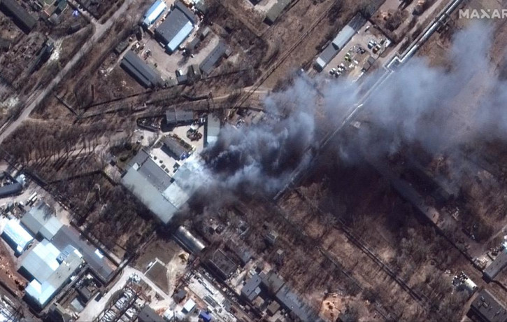 This satellite image provided by Maxar Technologies shows a closeup view of fires in an industrial area and nearby fields in southern Chernihiv, Ukraine, during the Russian invasion, Thursday