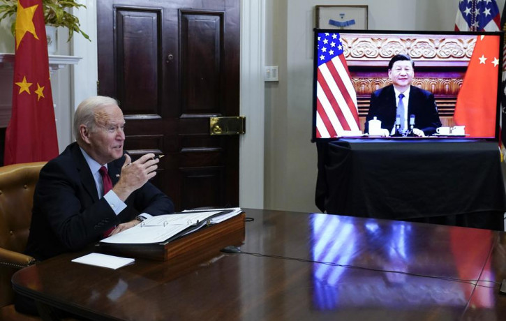 US President Joe Biden meets virtually with Chinese President Xi Jinping from the Roosevelt Room of the White House in Washington, on Nov. 15, 2021.