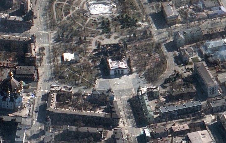 This satellite image provided by Maxar Technologies on Saturday, March 19, 2022 shows the aftermath of the airstrike on the Mariupol Drama theater, Ukraine, and the area around it.