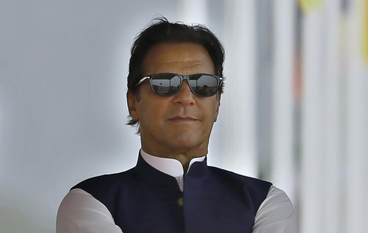 Pakistan's Prime Minister Imran Khan attends a military parade to mark Pakistan National Day, in Islamabad, Pakistan on March 23, 2022.