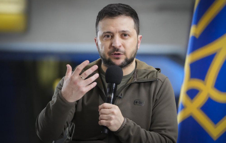 Ukrainian President Volodymyr Zelenskyy answers media questions during a press conference in a city subway under a central square in Kyiv, Ukraine, Saturday, April 23, 2022.