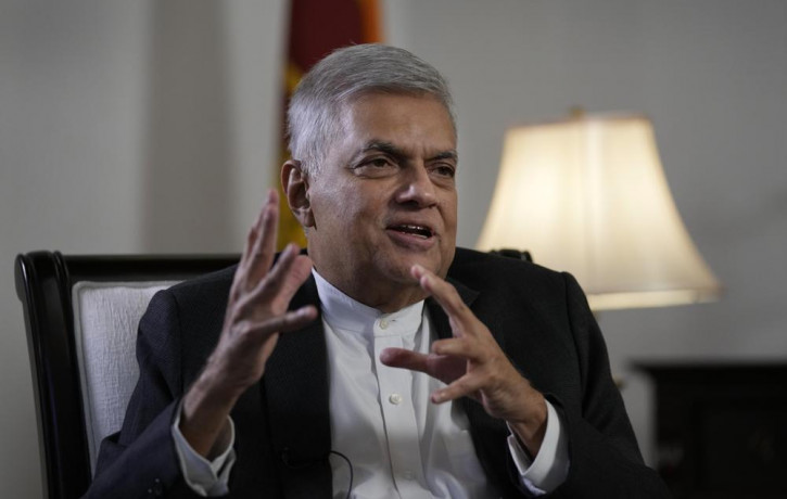 Sri Lanka's new prime minister Ranil Wickremesinghe gestures during an interview with The Associated Press in Colombo, Sri Lanka, Saturday, June 11, 2022.