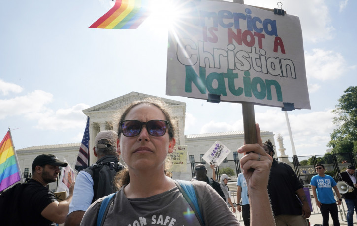 People protest about abortion, Friday, June 24, 2022, outside the Supreme Court in Washington. (AP Photo/RSS)