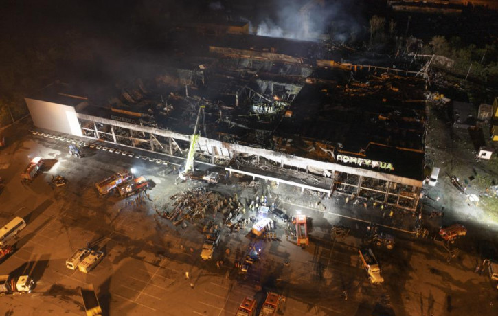 Ukrainian State Emergency Service firefighters work to extinguish a fire at a shopping center burned after a rocket attack in Kremenchuk, Ukraine, late Monday, June 27, 2022.  AP/RSS Photo