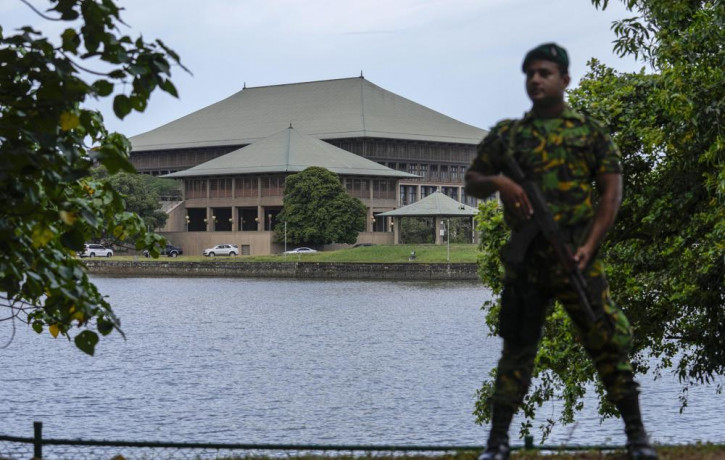 An army soldier soldier stands guard outside the parliament building in Colombo, Sri Lanka, Saturday, July 16, 2022. AP/RSS Photo